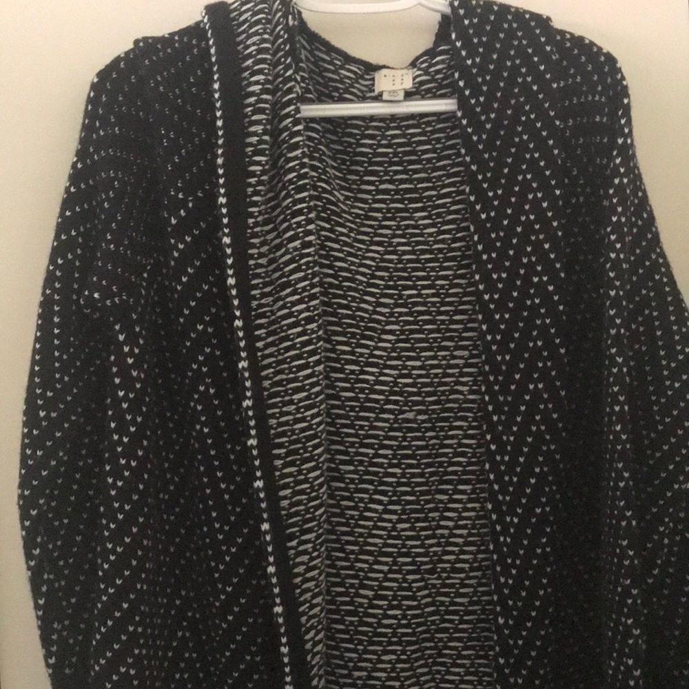 Heart shaped black and white sweater